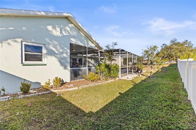 view of yard featuring a lanai