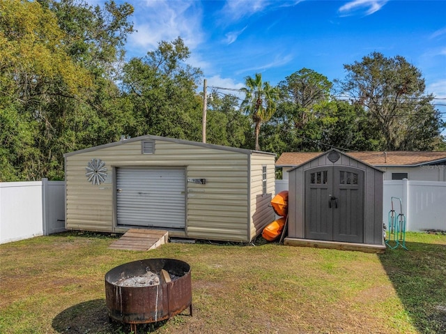 view of outbuilding featuring a yard