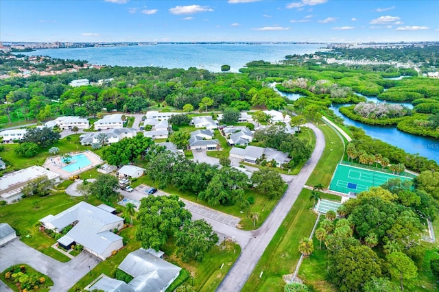 birds eye view of property featuring a water view