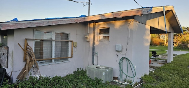 view of property exterior with central air condition unit