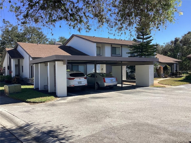 view of front of house featuring a carport