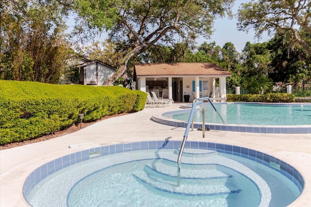 1808 Cypress Trace Dr Unit 1808, Safety Harbor, FL 34695 - community pool with a community hot tub and a patio area