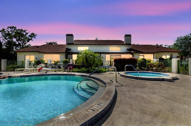 1808 Cypress Trace Dr Unit 1808, Safety Harbor, FL 34695 - community pool featuring a community hot tub and a patio area