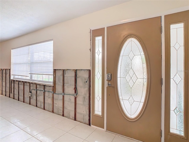 foyer with light tile patterned flooring