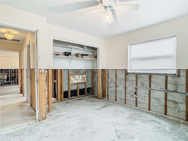 basement with ceiling fan