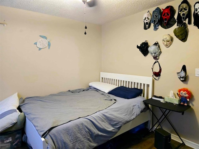 bedroom featuring a textured ceiling