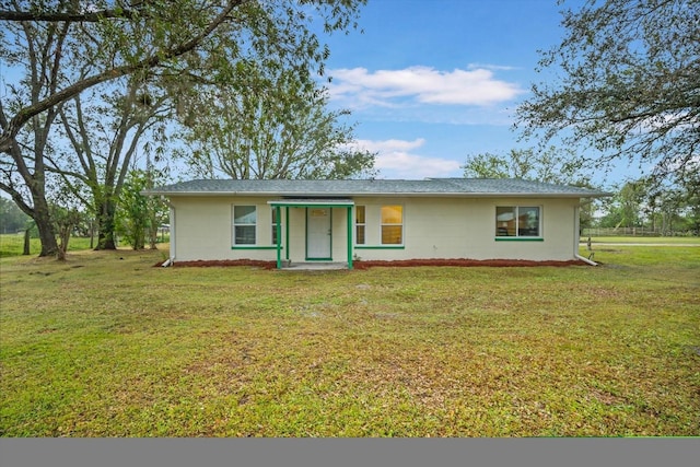 ranch-style house with a front yard