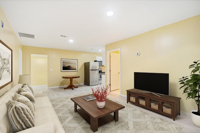 living room with light wood-type flooring