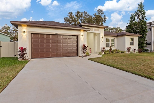 view of front of property with cooling unit, a front yard, and a garage