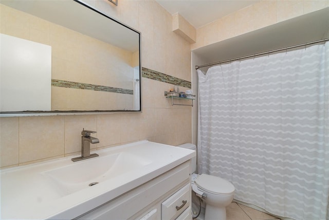 bathroom featuring decorative backsplash, vanity, tile walls, tile patterned flooring, and toilet