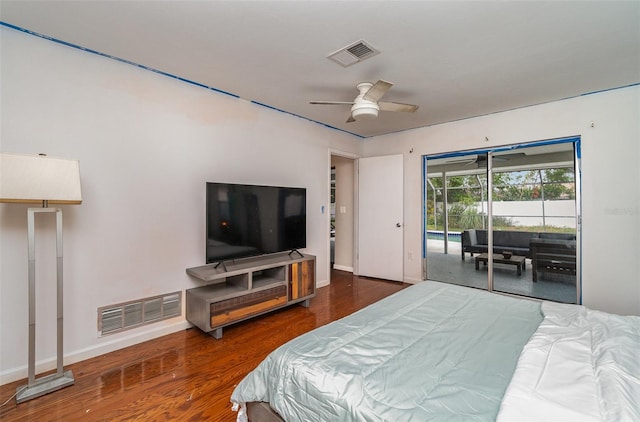 bedroom with ceiling fan, dark wood-type flooring, and access to outside