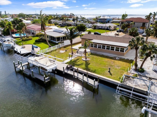 drone / aerial view with a water view