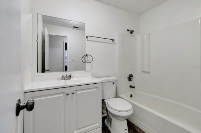 full bathroom featuring wood-type flooring, vanity, toilet, and shower / bathtub combination