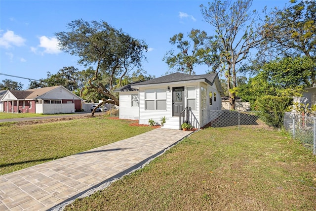 exterior space featuring a front lawn