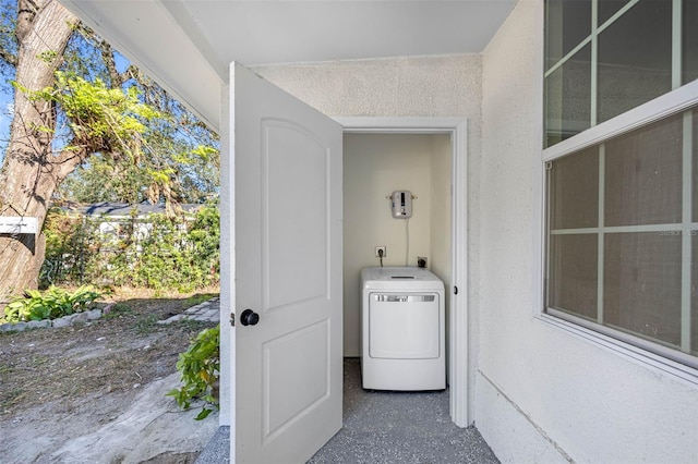 washroom featuring washer / dryer