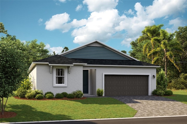 view of front of home with a garage and a front lawn