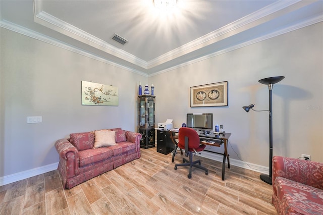 home office featuring light hardwood / wood-style flooring and ornamental molding