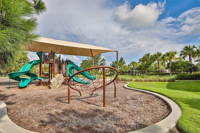 view of playground with a yard