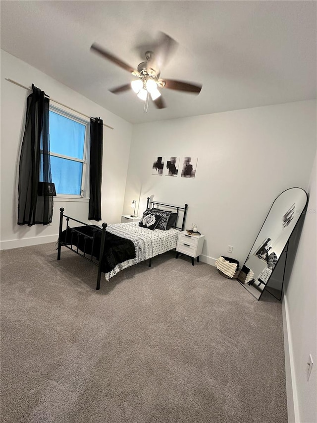 3208 Deleuil Ave, Tampa, FL 33610 - carpeted bedroom featuring baseboards and ceiling fan
