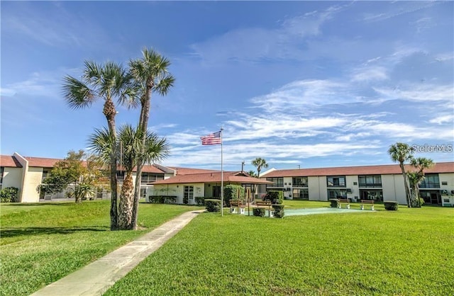 exterior space featuring a front lawn