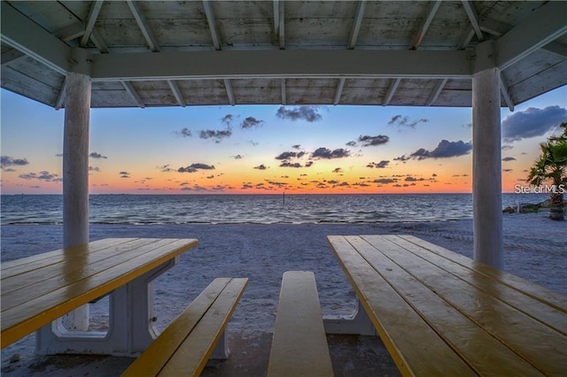 dock area with a gazebo and a water view