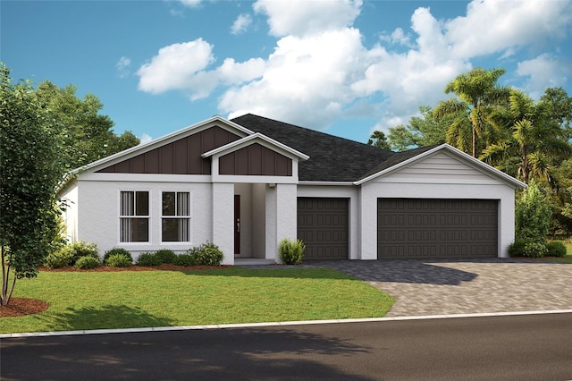 view of front of property with an attached garage, roof with shingles, decorative driveway, a front lawn, and board and batten siding