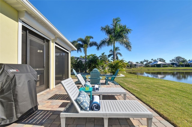 view of patio featuring a water view