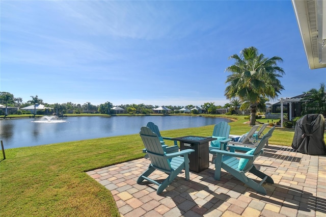 view of patio featuring a water view