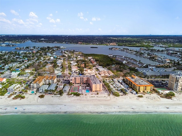 bird's eye view featuring a water view and a beach view