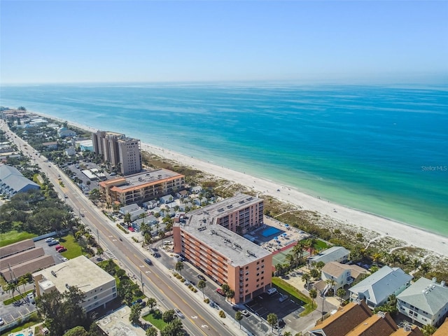 drone / aerial view with a water view and a view of the beach