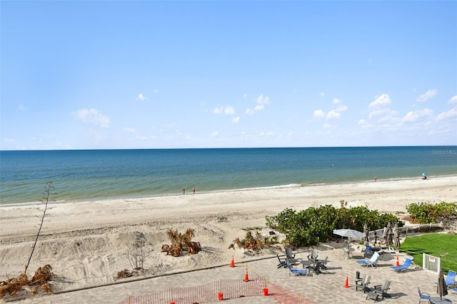 property view of water featuring a beach view