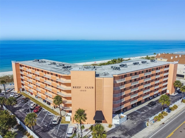 bird's eye view featuring a beach view and a water view