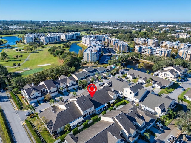 bird's eye view with a water view