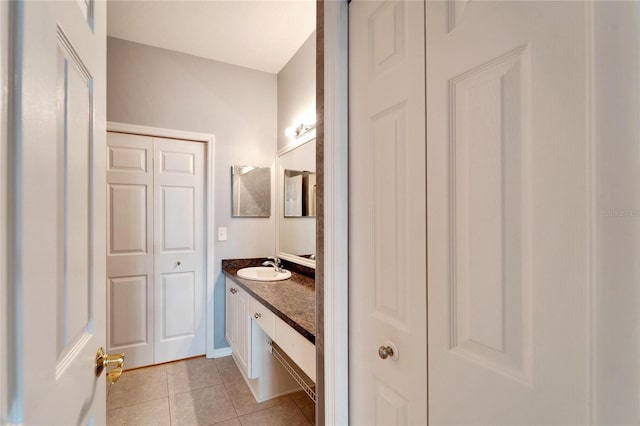 bathroom featuring tile patterned floors and vanity