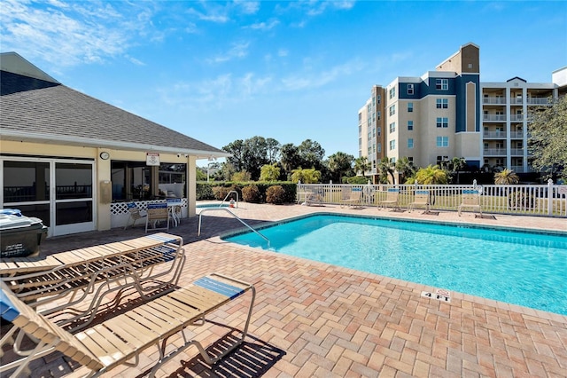 view of pool featuring a patio