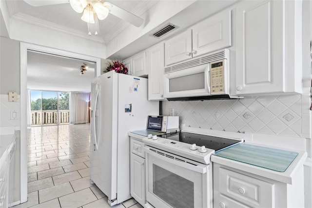 kitchen with ceiling fan, white cabinetry, white appliances, and tasteful backsplash