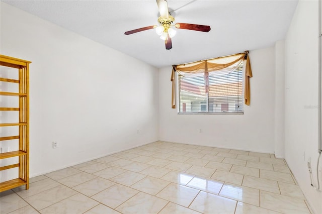 2650 Pearce Dr Unit 403, Clearwater, FL 33764 - spare room with ceiling fan and light tile patterned flooring
