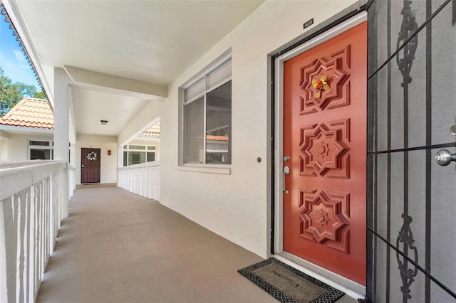 2650 Pearce Dr Unit 403, Clearwater, FL 33764 - doorway to property with stucco siding