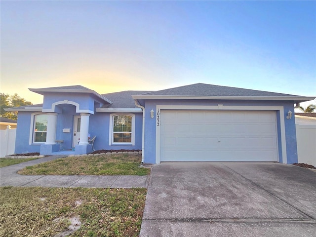 view of front of home with a garage