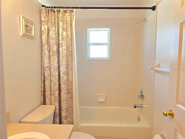 full bathroom with shower / tub combo with curtain, toilet, and sink