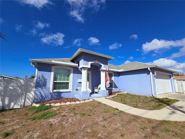 view of front of house with a garage