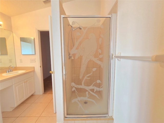 bathroom with vanity, tile patterned flooring, and a shower with door