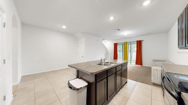 kitchen with sink, stainless steel dishwasher, a center island with sink, electric range, and light colored carpet