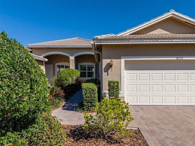 view of front of home with a garage