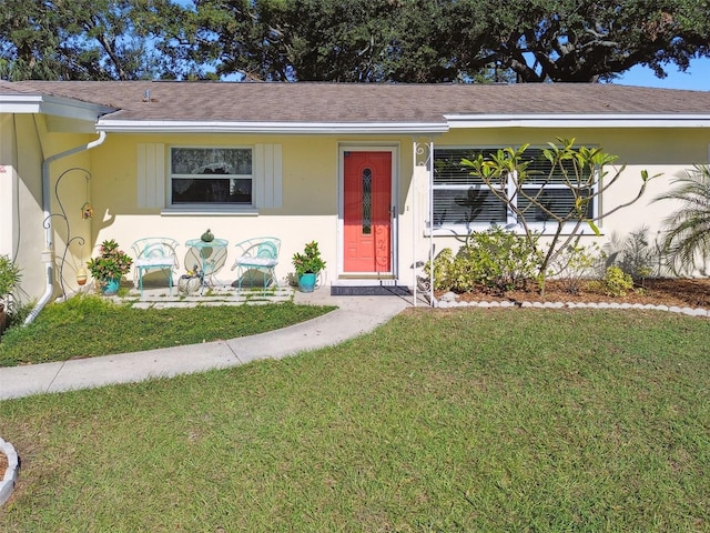 view of front of home with a front yard