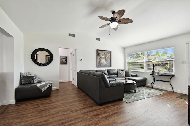 living room with dark hardwood / wood-style floors, vaulted ceiling, and ceiling fan