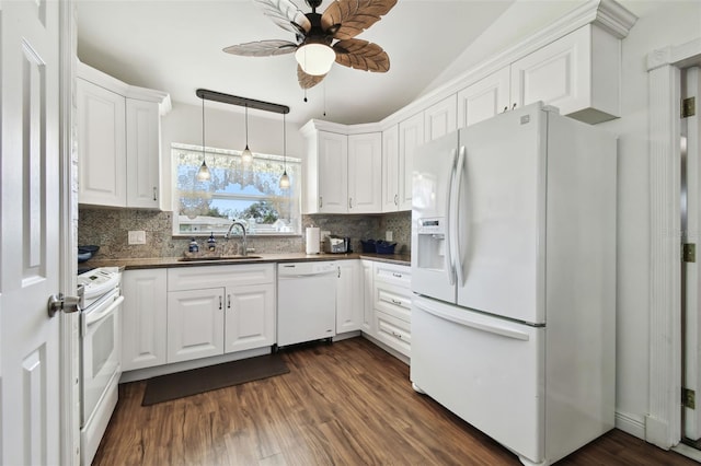 kitchen with white cabinetry, sink, dark wood-type flooring, tasteful backsplash, and white appliances