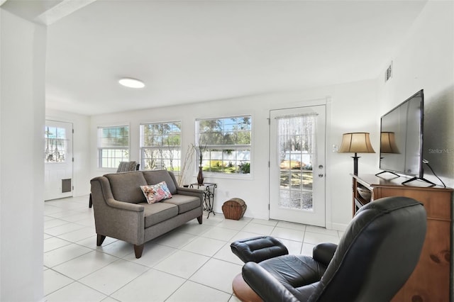 living room featuring light tile patterned floors