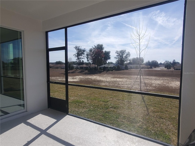 view of unfurnished sunroom