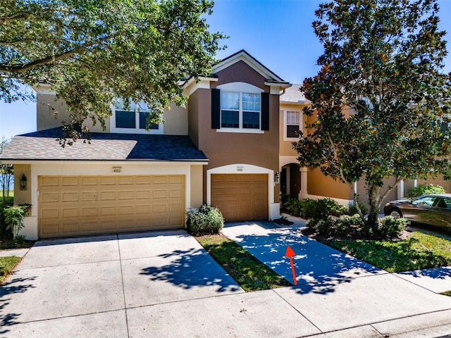 view of front of property with a garage